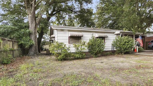 135 Aero Dr, Defuniak Springs, FL 32433 - view of front of house with a metal roof