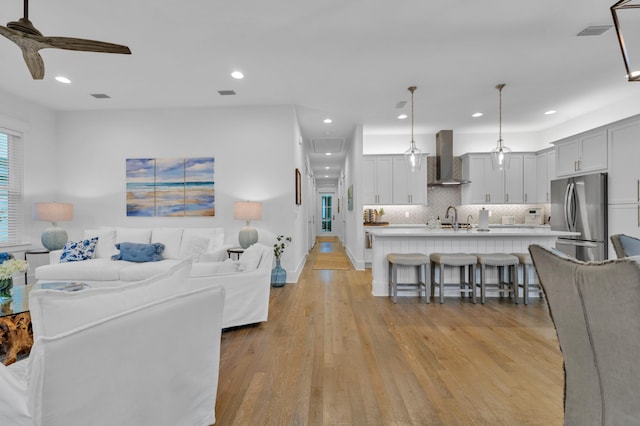 22 Cypress Rdg, Santa Rosa Beach, FL 32459 - living room with light wood finished floors, ceiling fan, and recessed lighting