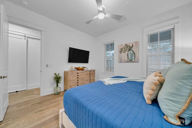 22 Cypress Rdg, Santa Rosa Beach, FL 32459 - bedroom featuring light wood finished floors and a ceiling fan