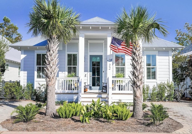 22 Cypress Rdg, Santa Rosa Beach, FL 32459 - view of front of home featuring covered porch and a metal roof
