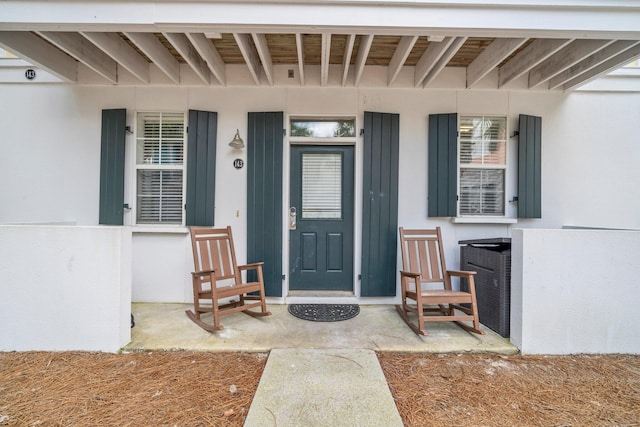 198 Somerset Bridge Rd Unit 143, Santa Rosa Beach, FL 32459 - property entrance featuring a porch and stucco siding