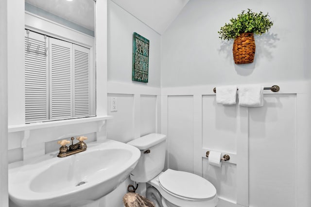 198 Somerset Bridge Rd Unit 143, Santa Rosa Beach, FL 32459 - half bathroom featuring a sink and lofted ceiling
