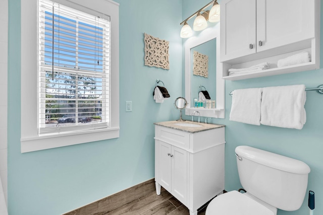 198 Somerset Bridge Rd Unit 143, Santa Rosa Beach, FL 32459 - bathroom with healthy amount of natural light, vanity, and wood finished floors