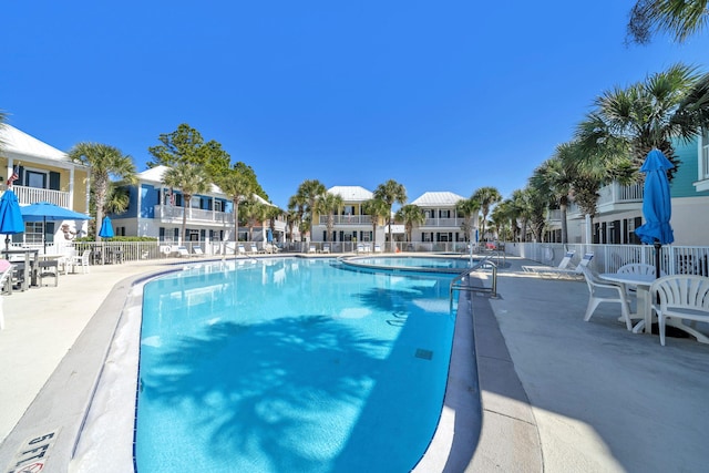 198 Somerset Bridge Rd Unit 143, Santa Rosa Beach, FL 32459 - community pool featuring a residential view and a patio