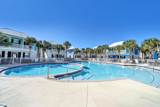 198 Somerset Bridge Rd Unit 143, Santa Rosa Beach, FL 32459 - community pool featuring a patio area and a residential view