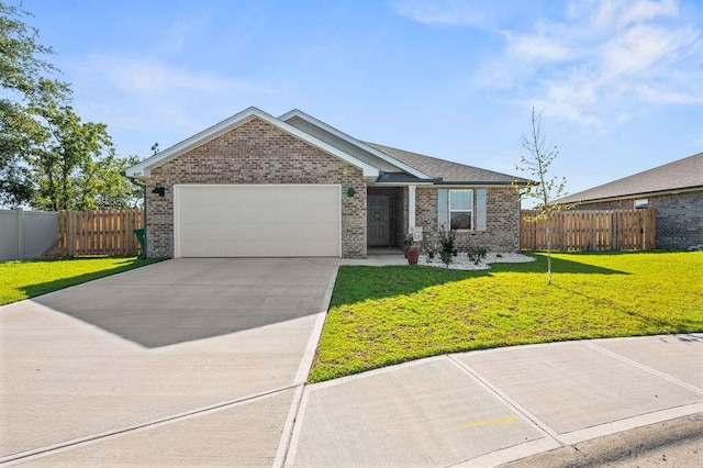 4649 Naval Ct, Crestview, FL 32539 - view of front of house featuring brick siding, a garage, and driveway