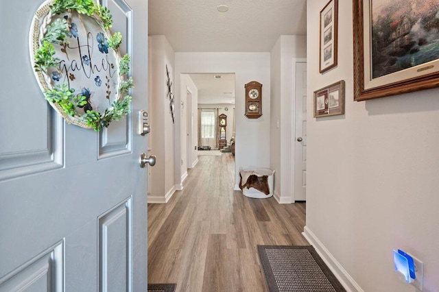 4649 Naval Ct, Crestview, FL 32539 - foyer featuring baseboards and wood finished floors