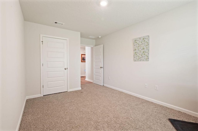 4649 Naval Ct, Crestview, FL 32539 - unfurnished bedroom with carpet flooring and baseboards