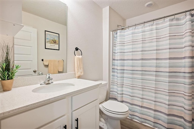 4649 Naval Ct, Crestview, FL 32539 - full bath with a textured ceiling, vanity, and curtained shower