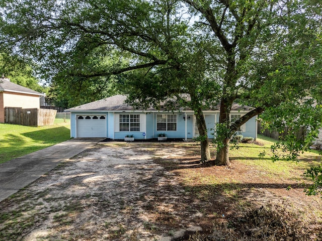 126 Claire Dr, Crestview, FL 32536 - ranch-style house with driveway and an attached garage
