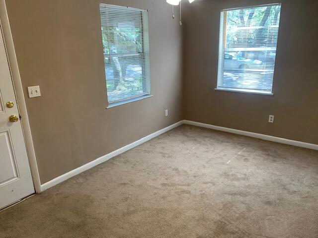 947 Don Dr, Fort Walton Beach, FL 32547 - empty room with light colored carpet