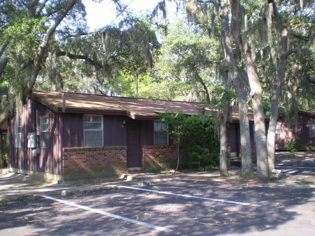 947 Don Dr, Fort Walton Beach, FL 32547 - view of front of property with brick siding and uncovered parking