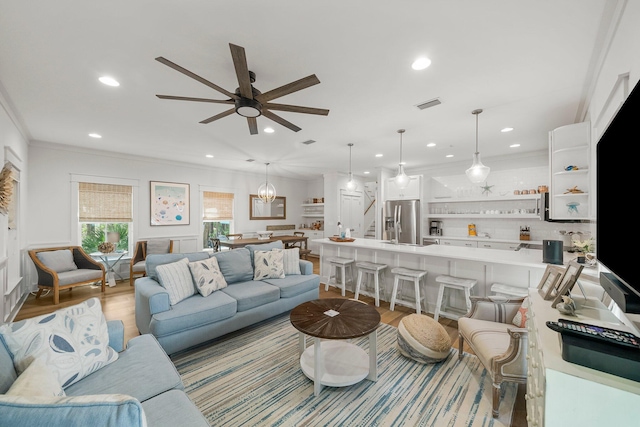 499 Patina Blvd, Inlet Beach, FL 32461 - living room with light wood-style floors, ceiling fan, recessed lighting, and ornamental molding