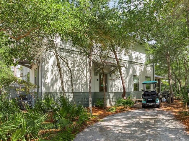 499 Patina Blvd, Inlet Beach, FL 32461 - view of side of home with asphalt driveway