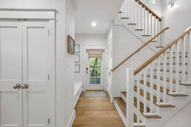 499 Patina Blvd, Inlet Beach, FL 32461 - entrance foyer with light wood-style floors, stairway, recessed lighting, and ornamental molding