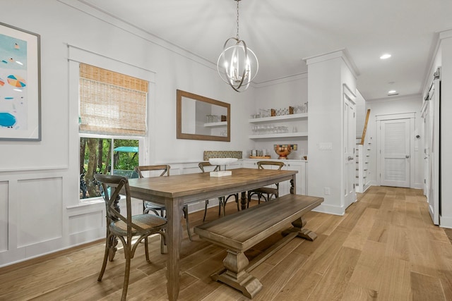 499 Patina Blvd, Inlet Beach, FL 32461 - dining room with light wood-style flooring, a chandelier, ornamental molding, and recessed lighting