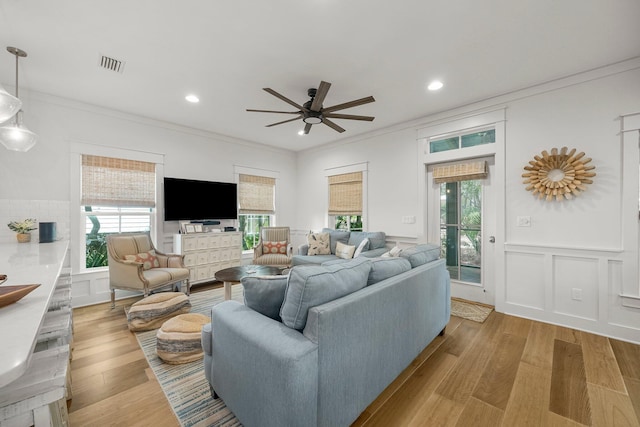 499 Patina Blvd, Inlet Beach, FL 32461 - living room featuring ornamental molding, a ceiling fan, light wood-type flooring, plenty of natural light, and recessed lighting