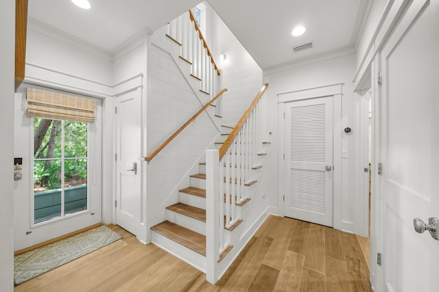 499 Patina Blvd, Inlet Beach, FL 32461 - stairs featuring wood finished floors, crown molding, and recessed lighting