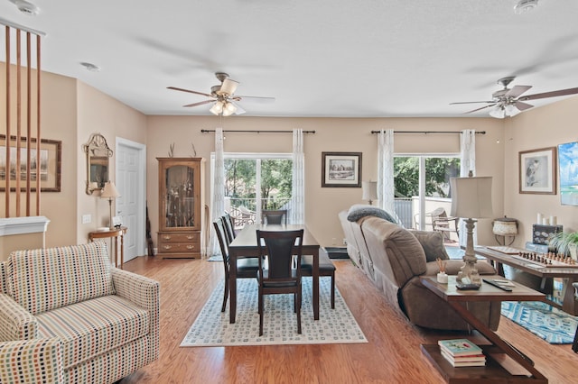 6341 Augusta Cv, Destin, FL 32541 - dining room featuring a ceiling fan and wood finished floors