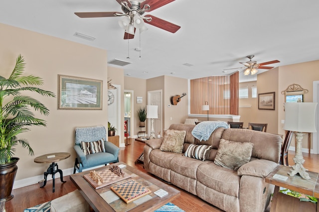 6341 Augusta Cv, Destin, FL 32541 - living area with ceiling fan and wood finished floors