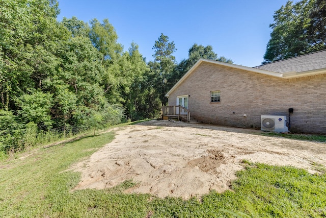 5981 Creekside Cir, Crestview, FL 32536 - view of property exterior featuring brick siding and a deck