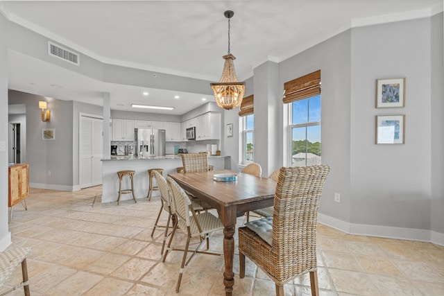 164 Blue Lupine Way Unit 411, Santa Rosa Beach, FL 32459 - dining area with a chandelier, recessed lighting, and stone tile floors
