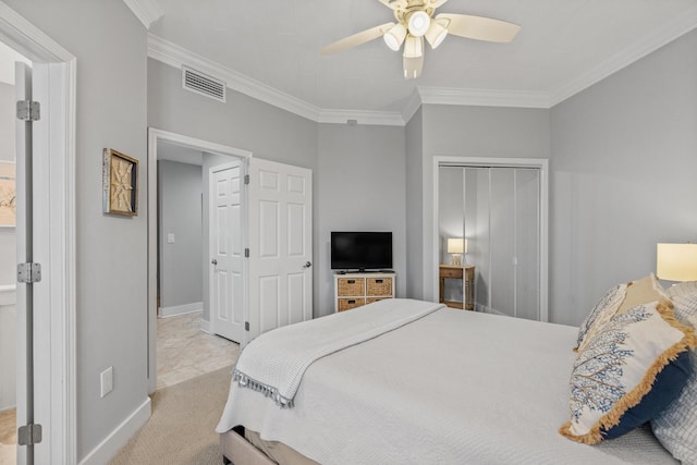 164 Blue Lupine Way Unit 411, Santa Rosa Beach, FL 32459 - carpeted bedroom featuring ornamental molding, a closet, ceiling fan, and connected bathroom