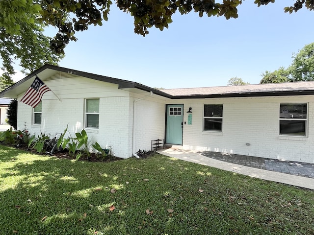 612 NE Powell Dr, Fort Walton Beach, FL 32547 - single story home with brick siding and a front lawn