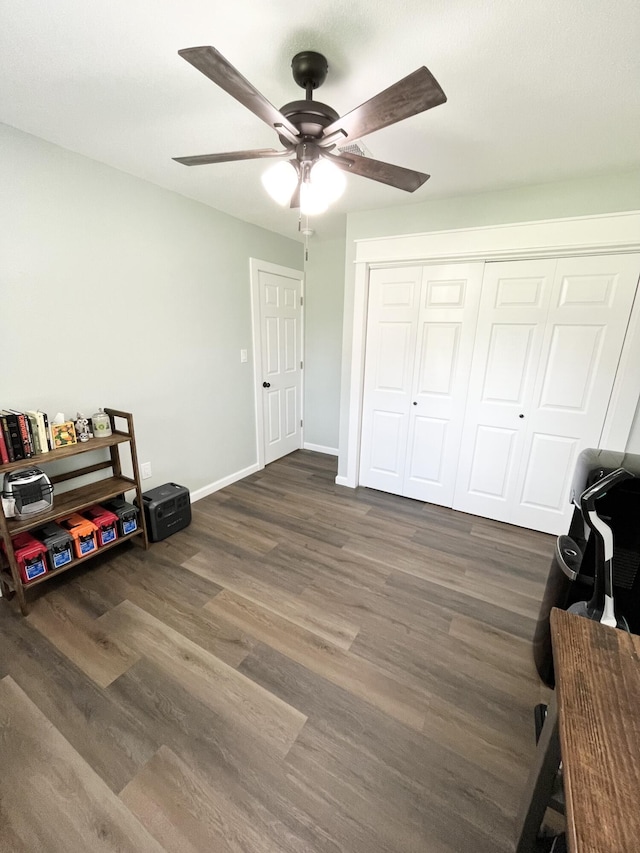 612 NE Powell Dr, Fort Walton Beach, FL 32547 - bedroom with wood finished floors, a closet, and a ceiling fan