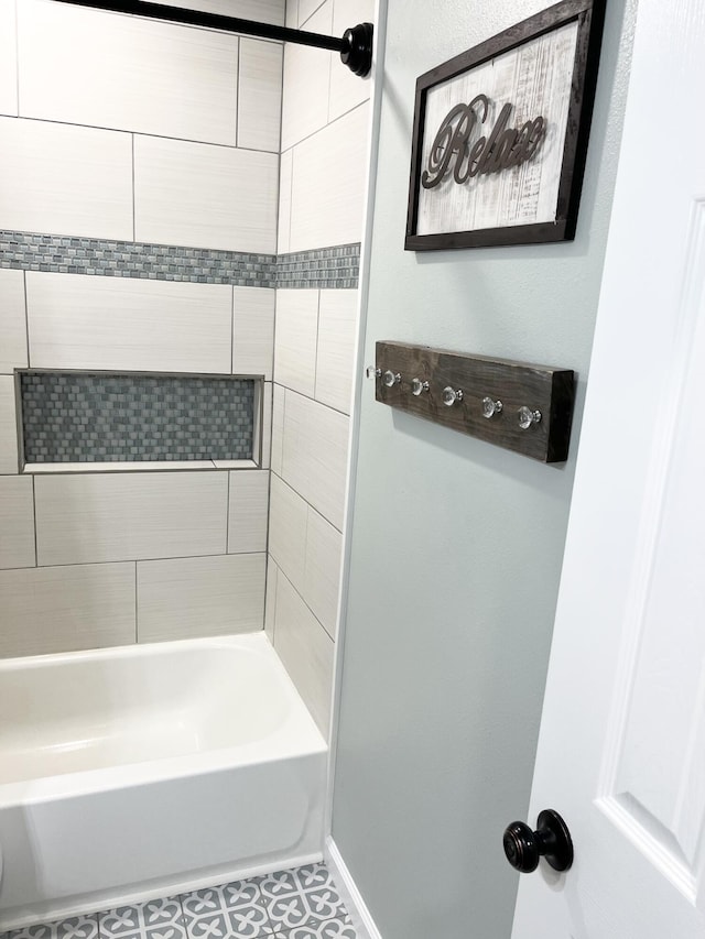 612 NE Powell Dr, Fort Walton Beach, FL 32547 - bathroom with tub / shower combination and tile patterned floors