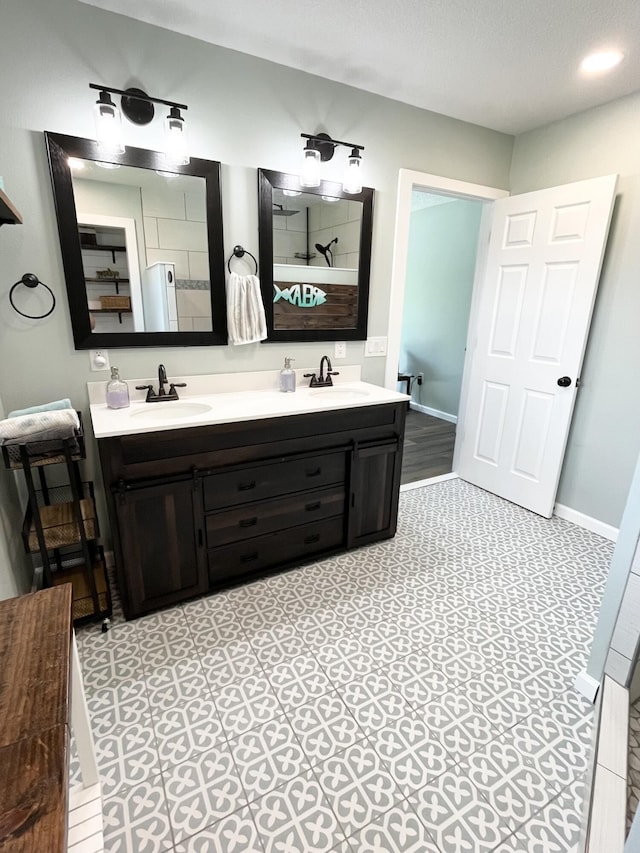 612 NE Powell Dr, Fort Walton Beach, FL 32547 - bathroom with double vanity and a shower