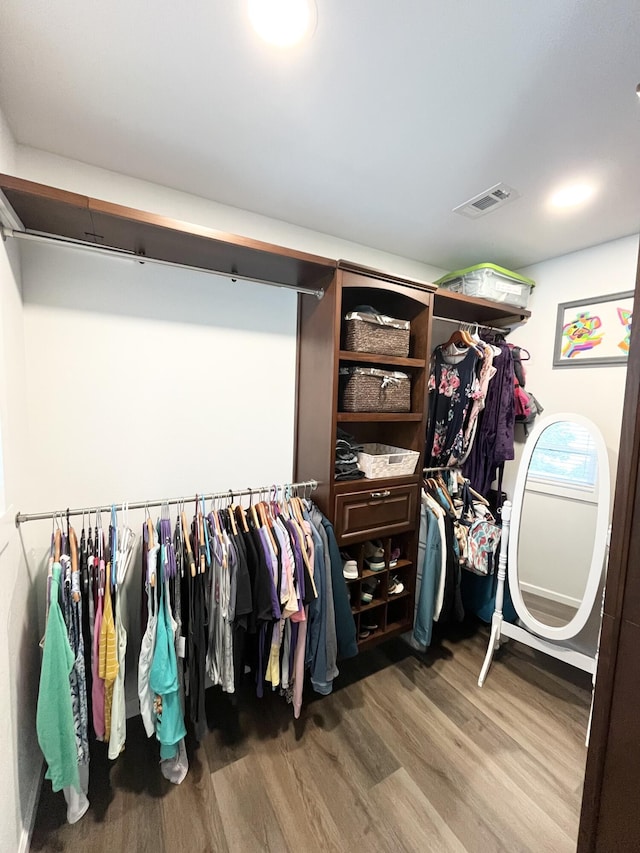 612 NE Powell Dr, Fort Walton Beach, FL 32547 - walk in closet featuring wood finished floors