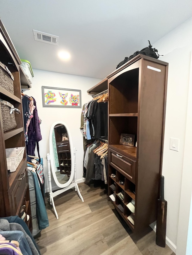 612 NE Powell Dr, Fort Walton Beach, FL 32547 - spacious closet featuring light wood-style flooring