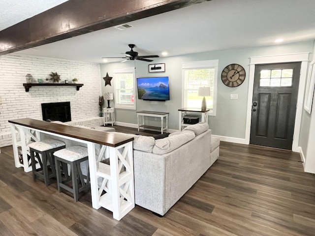 612 NE Powell Dr, Fort Walton Beach, FL 32547 - living area with a fireplace, dark wood-style flooring, a ceiling fan, and recessed lighting