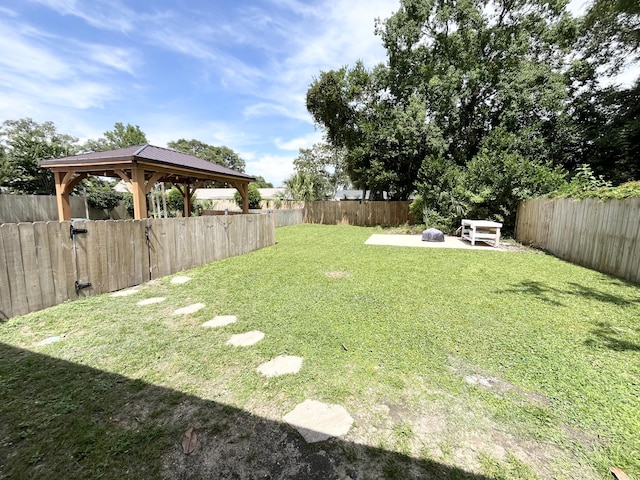 612 NE Powell Dr, Fort Walton Beach, FL 32547 - fenced backyard with a gazebo