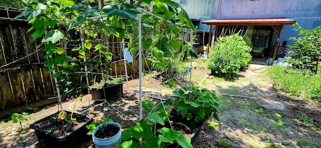 904 Tokalon Ct, Fort Walton Beach, FL 32547 - fenced backyard with a vegetable garden