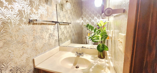 904 Tokalon Ct, Fort Walton Beach, FL 32547 - bathroom featuring wallpapered walls and vanity