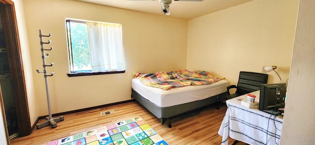 904 Tokalon Ct, Fort Walton Beach, FL 32547 - bedroom with wood finished floors, multiple windows, and ceiling fan