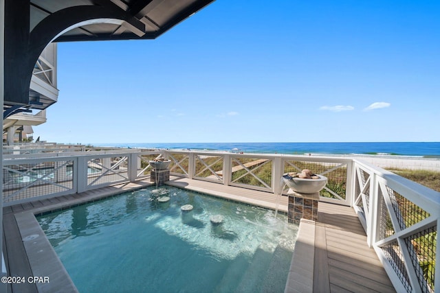 19989 Front Beach Rd, Panama City Beach, FL 32413 - view of swimming pool featuring a deck with water view and view of local beach