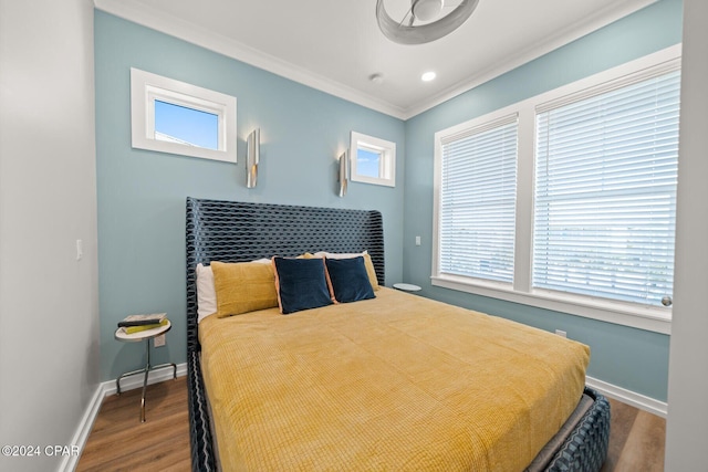 19989 Front Beach Rd, Panama City Beach, FL 32413 - bedroom featuring wood finished floors and crown molding