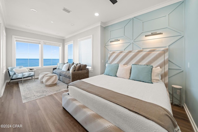 19989 Front Beach Rd, Panama City Beach, FL 32413 - bedroom with wood finished floors, crown molding, a water view, and recessed lighting
