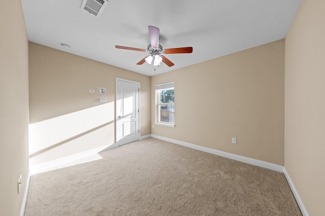 8152 Nevada St, Navarre, FL 32566 - empty room with carpet flooring and a ceiling fan
