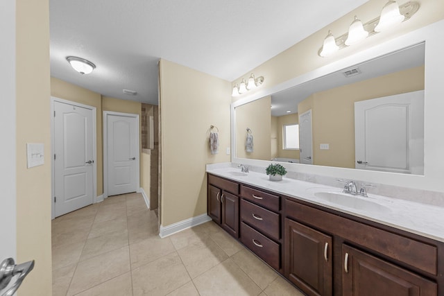 8152 Nevada St, Navarre, FL 32566 - full bathroom featuring double vanity and tile patterned flooring