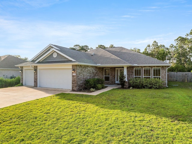 8152 Nevada St, Navarre, FL 32566 - single story home featuring a garage, driveway, brick siding, and a shingled roof