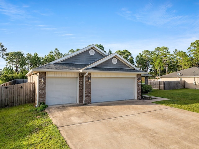 8152 Nevada St, Navarre, FL 32566 - view of front facade with concrete driveway, brick siding, and a garage