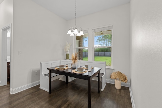 8152 Nevada St, Navarre, FL 32566 - dining room featuring dark wood finished floors and a chandelier