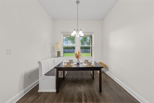 8152 Nevada St, Navarre, FL 32566 - dining room featuring dark wood-type flooring and a chandelier