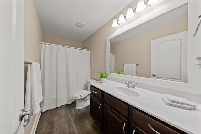8152 Nevada St, Navarre, FL 32566 - full bathroom featuring vanity, wood finished floors, and a shower with shower curtain