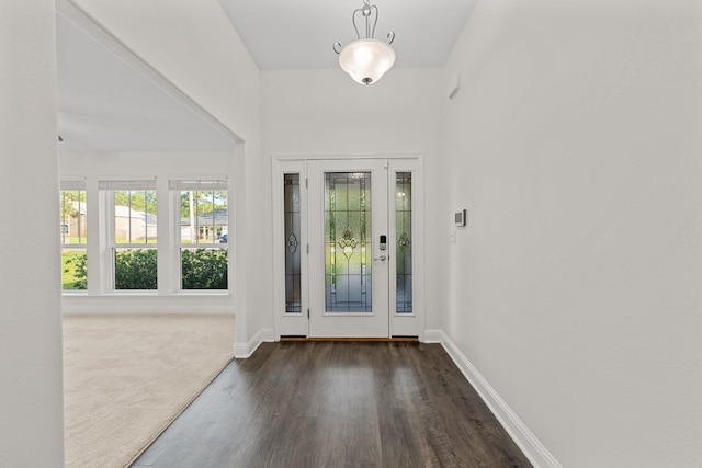 8152 Nevada St, Navarre, FL 32566 - entryway with dark wood-type flooring and baseboards