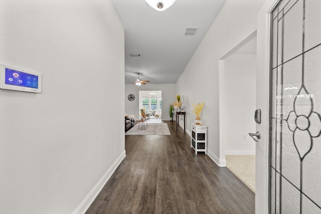 8152 Nevada St, Navarre, FL 32566 - corridor featuring wood finished floors and baseboards